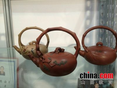 浅谈陈海平先生紫砂壶艺与中华文化的融合(1)